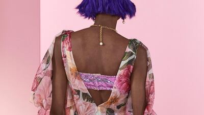 The 'Power Pastel' collection for women was fresh and youthful, like this dress that left the bra strap on display. Courtesy of Dolce & Gabbana