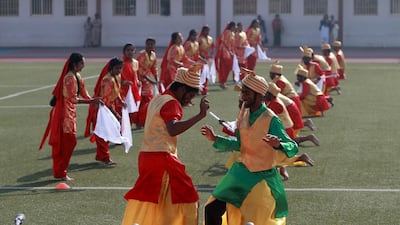 Abu Dhabi Indian School pupils perform a traditional dance to mark India’s Republic Day on Sunday. Ravindranath K / The National