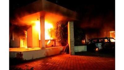 The killing of Americans in Benghazi will not reduce Americans' devotion to free speech, a reader says, while another deplores the manipulation of mass emotion in both cultures. Mustafa El-Shridi / EPA