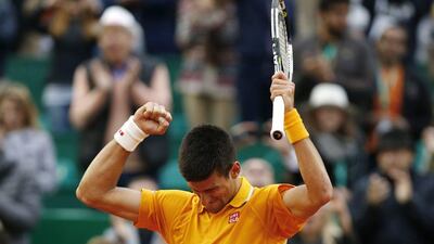 Novak Djokovic celebrates after winning the Monte Carlo Masters final against Tomas Berdych on Sunday. Jean-Christophe Magnenet / AFP / April 19, 2015