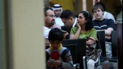 DUBAI, UNITED ARAB EMIRATES – Dec 24: People waiting for their turn at Emirates Identity Authority registration centre in Al Barsha in Dubai.. (Pawan Singh / The National) Story by Gregor McClenaghan *** Local Caption *** PS05- ID CARDS.jpg