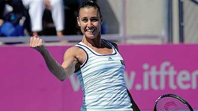 Flavia Pennetta celebrates after winning against Jarmila Groth in Hobart.
