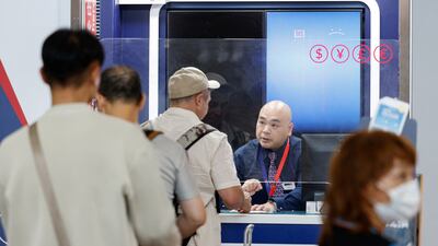 A screen shows an error at a currency exchange store at Hong Kong International Airport. Reuters
