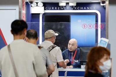 Screen showing an error is seen at a currency exchange store at Hong Kong International Airport amid system outages disrupting the operations, in Hong Kong, China, July 19, 2024. REUTERS / Tyrone Siu