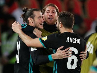 Gareth Bale, second right, scores with his first touch after coming on as a Real Madrid substitute. It would prove to be the winner. Martin Dokoupil / EPA