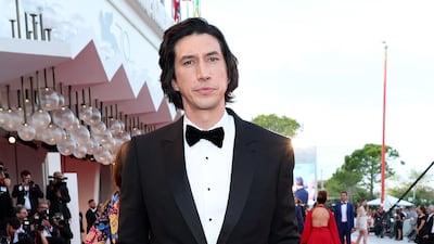 Adam Driver wears a black tuxedo. Getty Images