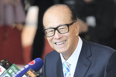 Hong Kong's richest man Li Ka-shing, plans to invest $30m for an unknown slice of the Chinese smartphone maker Xiaomi. Anthony Wallace/ AFP