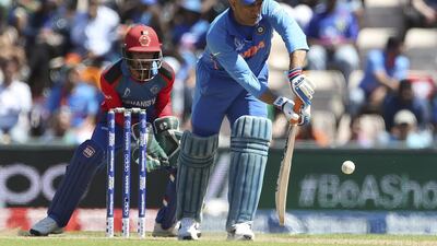 MS Dhoni (5/10): He struggled with the bat, scoring just 28, but he deserves some credit for holding one end up. There is a good chance India will have collapsed if not for Dhoni showing a little strategic patience. Aijaz Rahi / AP Photo