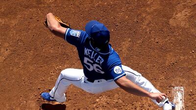 Kansas City Royals starting pitcher Brad Keller throws in the bullpen before a spring training baseball game against the San Diego Padres in Surprise, Arizona, on Monday, February 24. AP