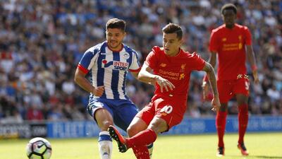 Liverpool forward Philippe Coutinho has a shot at goal. Lee Smith / Reuters