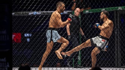 Mehdi Saadi, right, opened the bout by landing heavy calf kicks.
