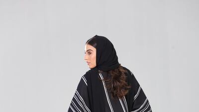 White patterns are etched into abayas at Beyond. Courtesy Beyond