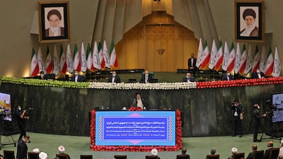 Iran's newly elected President Ebrahim Raisi (centre) speaks at his swearing in ceremony at the Iranian parliament in the capital Tehran.