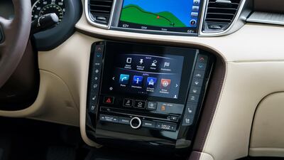 The interior features two seven-inch touchscreens on the centre console. Infiniti