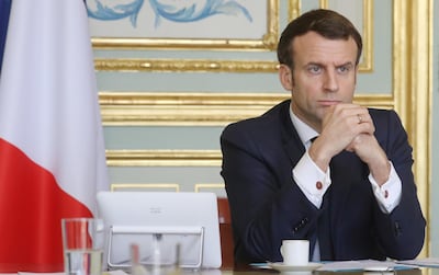 French President Emmanuel Macron takes part in a videoconference at the Elysee Palace with economic leaders on March 19, 2020. Reuters