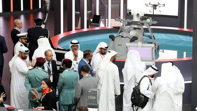 Visitors at the Edge stand on the first day of the UMEX & SimTEX. Pawan Singh / The National