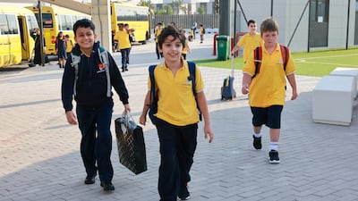 Pupils make their way to class at Muna British Academy. Victor Besa / The National