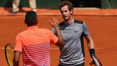 Andy Murray, right, and Nick Kyrgios greet each other at the net following their French Open encounter. Clive Brunskill / Getty