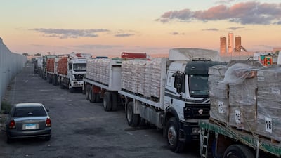 Aid lorries wait to enter Gaza via the Rafah crossing from Egypt as Israel stalls on the humanitarian side of the ceasefire deal. AFP