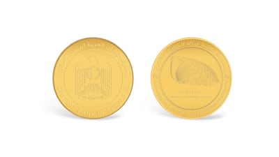 The gold coin features the Knowledge Centre of MBZUAI, alongside the years 2020 and 2025. Photo: UAE Central Bank