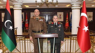 Turkish Defence Minister Yasar Guler, right, and Libya's Chief of the General Staff Lt Gen Mohammed Al Haddad during their meeting in Ankara on Tuesday December 23. AFP
