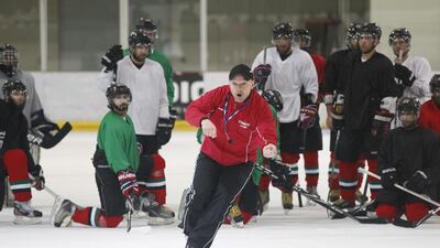 UAE national ice hockey team head coach Yuri Faikov, centre, runs a training session in Abu Dhabi on March 10, 2014, ahead of the IIHF Challenge Cup of Asia. Mona Al Marzooqi / The National