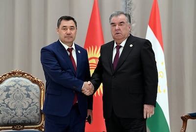 Kyrgyz President Sadyr Japarov shakes hands with Tajik President Emomali Rakhmon during a meeting on the sidelines of the Shanghai Co-operation Organisation (SCO) summit in Samarkand, Uzbekistan on September 16. Reuters