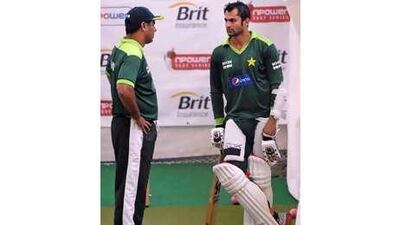 Waqar Younis, left, the Pakistan coach, has a chat with Shoaib Malik during a training session in the indoor nets at Edgbaston.
