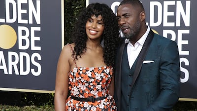 Sabrina Dhowre and Idris Elba arrive at the Golden Globes. EPA
