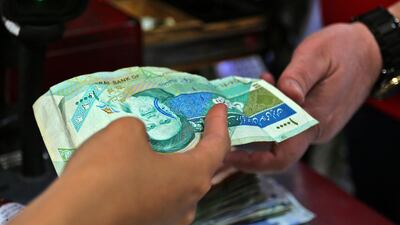 The Iranian economy is exptected to move deeper into recession this year. AFP