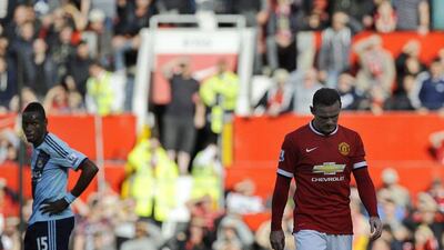 Manchester United's Wayne Rooney leaves the pitch following his red against West Ham United on Saturday in the Premier League. Phillip Richards / EPA / September 27, 2014