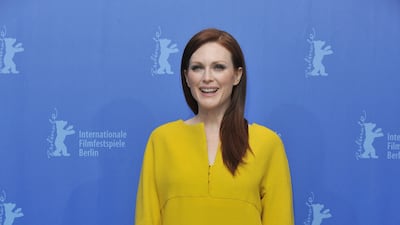 Julianne Moore, in a mustard shift dress, attends 'The Kids are All Right' photocall during the Berlin International Film Festival at the Grand Hyatt Hotel on February 17, 2010 in Berlin, Germany. Getty Images