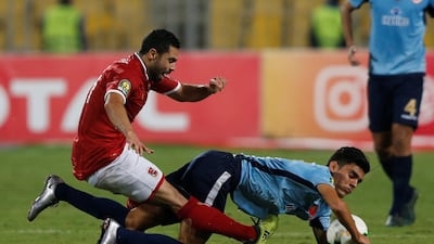 Wydad Casablanca's Achraf Bencharki in action with Al Ahly's Ahmed Fathy on Saturday. The game ended in a draw. Amr Abdallah Dalsh / Reuters