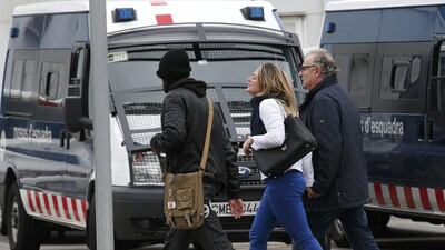 People believed to be family members of those killed in Germanwings plane crash arriving at Barcelona’s El Prat airport. Gustau Nacarino/Reuters