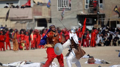 Local actors dressed as ancient warriors re-enact a scene from the 7th century battle of Kerbala during the religious festival of Ashura in Baghdad, Iraq. Khalid al-Mousily / Reuters