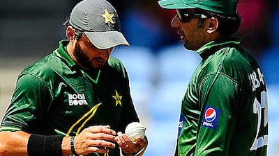 Sources say Shahid Afridi, left, was ignored by Misbah-ul-Haq, right, and Waqar Younis.