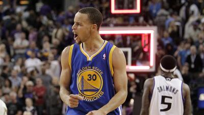 Stephen Curry led the Warriors with 27 points on Tuesday night. Rich Pedroncelli / AP