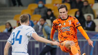 Juve's Federico Chiesa and Tomasz Kedziora of Kiev. EPA