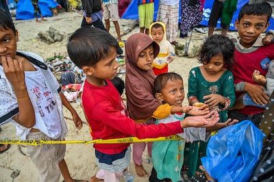Rohingya refugees in Indonesia's Aceh province on December 3, 2023. AFP