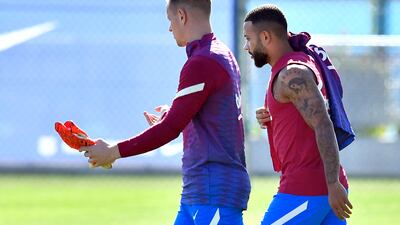 Barcelona's German goalkeeper Marc-Andre ter Stegen and Barcelona's Dutch forward Memphis Depay. AFP