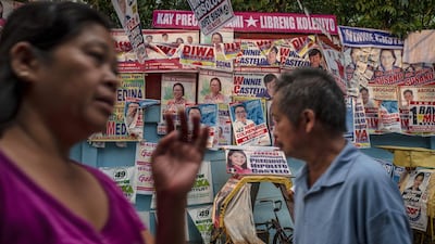 Campaign posters are seen along a street on May 12, 2019 in Quezon city, Metro Manila, Philippines. Getty