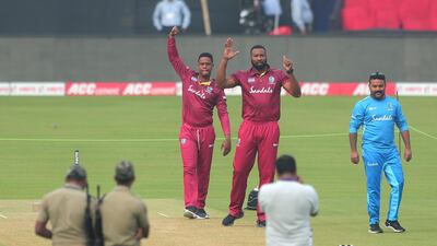 West Indies captain Kieron Pollard, right, and Shimron Hetmyer during a training session in Cuttack on Saturday. AP