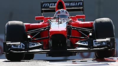 Timo Glock in the Marussia during first practice session at Yas Marina. Karim Sahib/AFP
