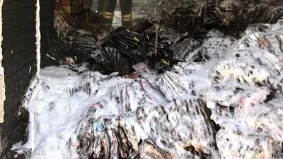 A fire spread to eight warehouses in Ras Al Khor on Saturday. Courtesy Dubai Civil Defence