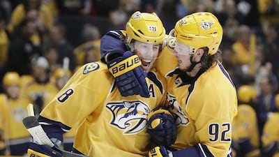 Nashville Predators centre Ryan Johansen (92) celebrates with James Neal after Johansen scored a goal against the Winnipeg Jets on November 25, 2016, in Nashville, Tennessee, USA. Mark Humphrey / AP