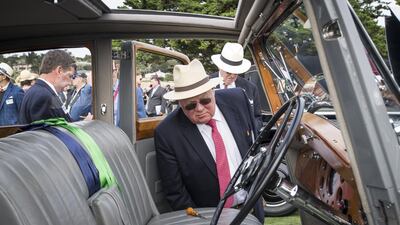 Judges view a 1937 Rolls-Royce Phantom III Barker Sports Saloon. Bloomberg