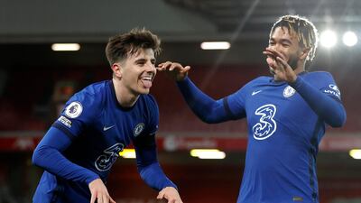 Mason Mount of Chelsea celebrates with teammate Reece James after scoring his team's first goal against Liverpool at Anfield. Getty