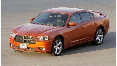 The new Charger, seen here at Dubai Autodrome, achieves what other big American cars have failed to do on countless occasions - deliver sensible handling through corners. Jaime Puebla / The National