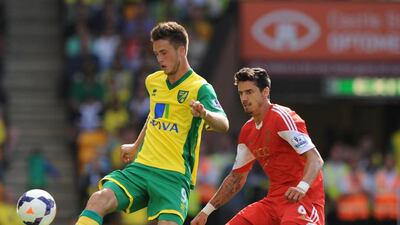 Striker: Ricky van Wolfswinkel, Norwich City. Scored on his debut. Never scored again. Cost a club record fee, too. Olly Greenwood / AFP