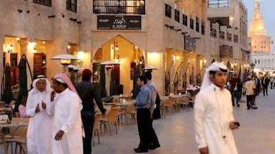 Restaurants and cafes line the street in Doha's Souk Waqif. The growing city also boasts two Gordon Ramsay restaurants. Ryan Carter / The National